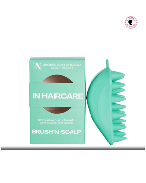 Brosse scalp en silicone verte In Haircare pour stimuler et purifier le cuir chevelu.